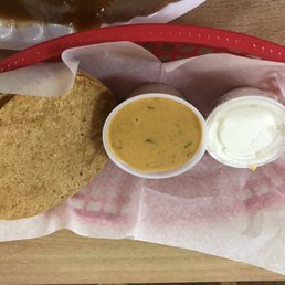Tortilla (?) things and queso dip. Tortilla (?) things and queso dip.