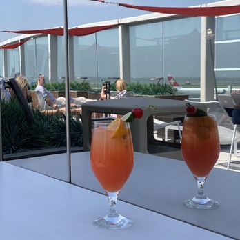 Delta Sky Club - Mai Tai on the Sky Deck and it's 75° out... - Airport Lounges Near Me - Jamaica, New York Delta Sky Club - Mai Tai on the Sky Deck and it's 75° out... - Airport Lounges Near Me - Jamaica, New York