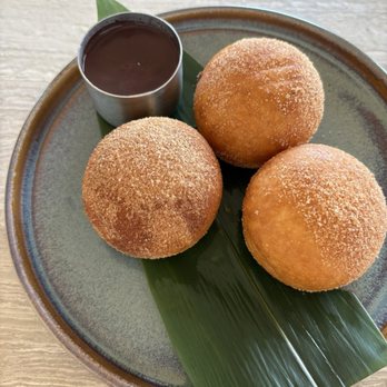 Conrad Orlando at Evermore - Papaya Club donuts with chocolate sauce (miso glaze was listed but not noticeable) - Hotels Near Me - Orlando, Florida