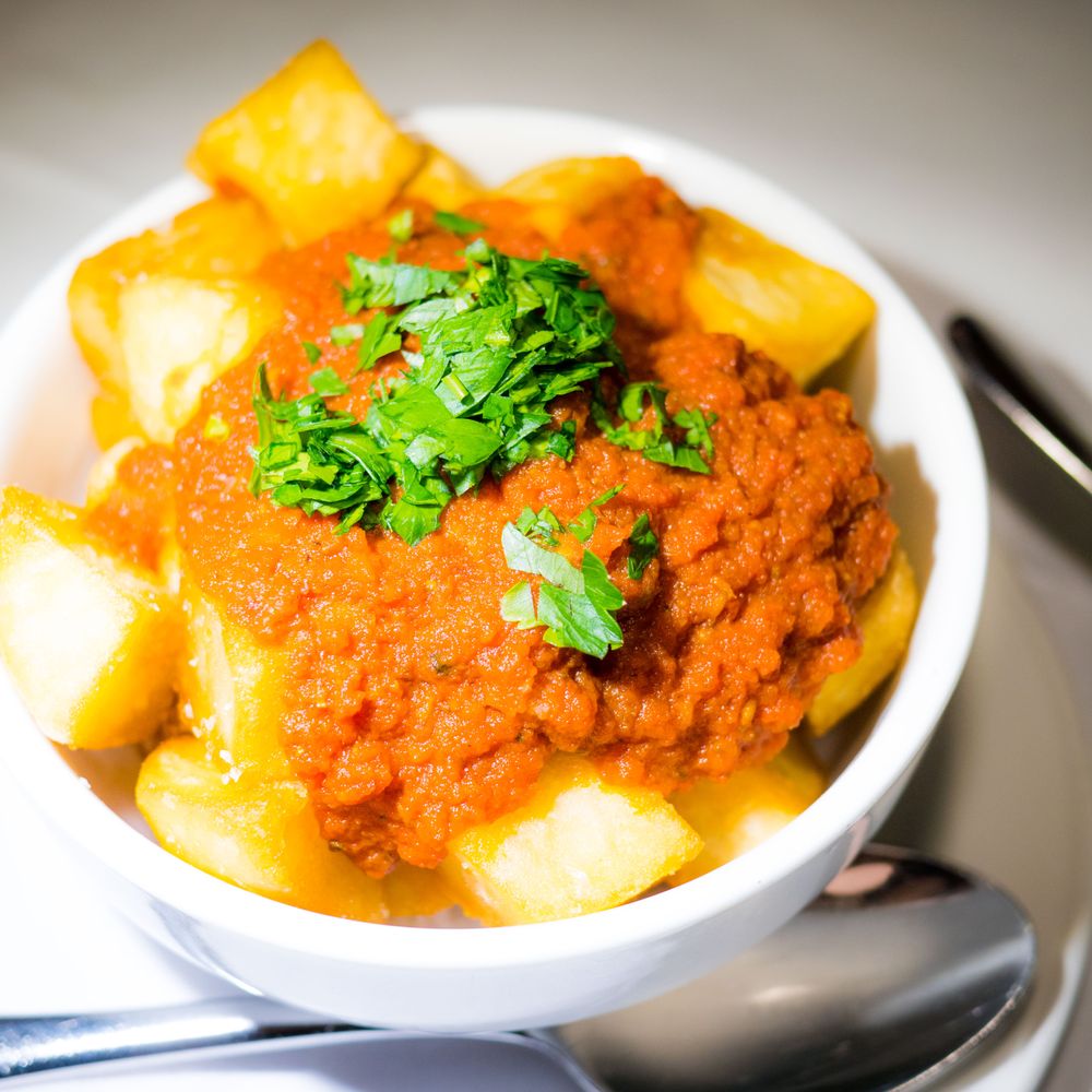 Cigala Restaurant - Patatas bravas (Deep fried potatoes with spicy tomato sauce - Spanish Near Me - London, XGL