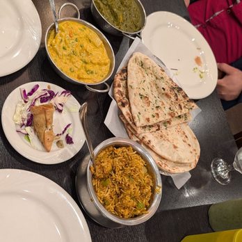 Nirvana Indian Cuisine - Chicken briyani, saag chicken, vegetable korma, garlic and plain naan - Indian Near Me - Arcadia, California