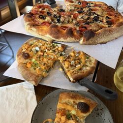 Wicked Pie Pizza - Top is sausage, pepperoni, mushrooms, and olives. Amazing! Bottom, was the chosen one, which I liked... and some will love