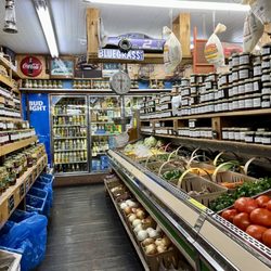 Eagle Island Seafood - More produce, canned veggies and beer coolers in back