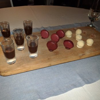 Sunset Monalisa - Complimentary dessert! Chocolate liqueur, hibiscus macarons, white chocolate and coconut, ginger and guava jelly - Mediterranean Near Me - Cabo San Lucas, BCS Sunset Monalisa - Complimentary dessert! Chocolate liqueur, hibiscus macarons, white chocolate and coconut, ginger and guava jelly - Mediterranean Near Me - Cabo San Lucas, BCS