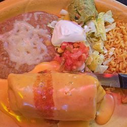 El Bohemio Mexican Restaurant - The Beef Chimichanga with rice and beans has gotten smaller
