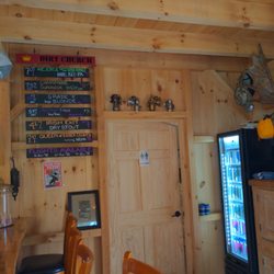Dirt Church Brewery - Menu on the wall and 4 packs to-go in the fridge.