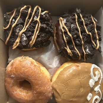 Voodoo Doughnut - Top: ODB Bottom Left: Glaze Bottom Right: Bavarian Cream filled maple donut - Bakeries Near Me - Orlando, Florida Voodoo Doughnut - Top: ODB Bottom Left: Glaze Bottom Right: Bavarian Cream filled maple donut - Bakeries Near Me - Orlando, Florida