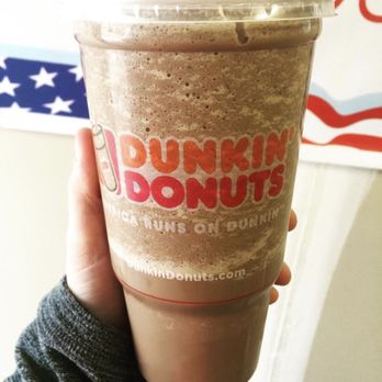 Dunkin' - a hand holding a cup of coffee - Donuts Near Me - Fort Leonard Wood, Missouri Dunkin' - a hand holding a cup of coffee - Donuts Near Me - Fort Leonard Wood, Missouri