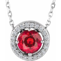 Cape Fear Custom Designs - 1 carat ruby surrounded with diamonds.  Custom made.