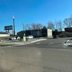 The Refinery Dispensary Kalamazoo - Clean parking lot, curbside pickup.
