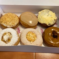 Portias Donut's - Lemon Up, Maple Cream, Pumpkin Cheesecake, Peaches-n-cream, Pumpkin pie, and Carmel Apple donuts (from top left to bottom right)