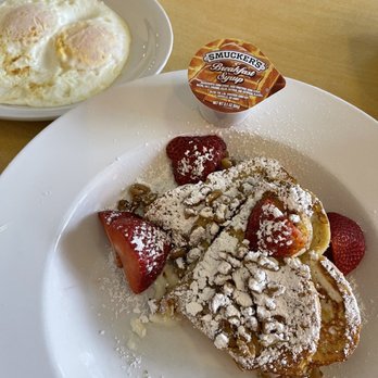 Le Peep Cafe - Stuffed French Toast and a side of eggs. Both so delicious and cooked to perfection...but, why Smuckers syrup?! - Breakfast & Brunch Near Me - San Antonio, Texas
