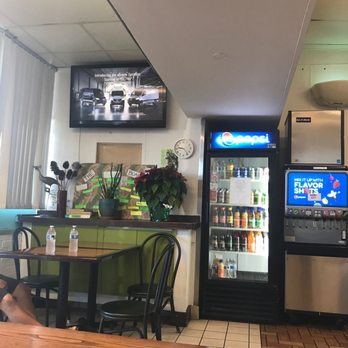 Joe's Grill Express - Watching college football while we wait for our breakfast.  A Pus! - American Near Me - Honolulu, Hawaii
