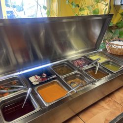 Trejo's Mexican Restaurant - Salsa and condiment bar self serve.