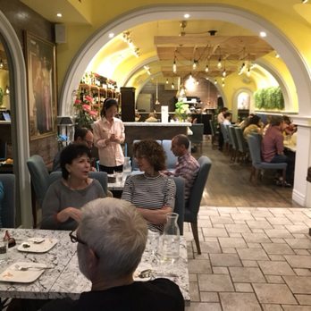 Nimman Thai Cuisine - a group of people sitting at a table - Thai Near Me - Toronto, Ontario