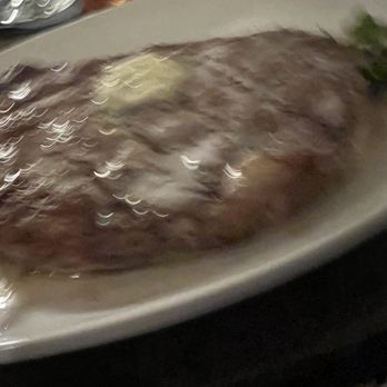 The Standard on Vaughan - An unintentionally blurry photo of the best ribeye I have had in ages - Cocktail Bars Near Me - Bertram, Texas
