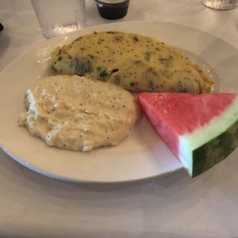 Restaurant Tyler - My make your own omelet with stiff Cheese grits and a piece of fruit. - New American Near Me - Starkville, Mississippi