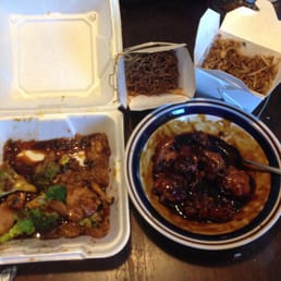 Peking Chicken on left, Sesame Pork on right, lo mein in the back and fried rice in back on right...not good at all... Peking Chicken on left, Sesame Pork on right, lo mein in the back and fried rice in back on right...not good at all...