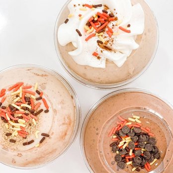 Pure Nutrition - three desserts in glass bowls - Juice Bars & Smoothies Near Me - Dyer, Indiana Pure Nutrition - three desserts in glass bowls - Juice Bars & Smoothies Near Me - Dyer, Indiana