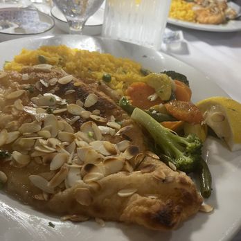 Lareira Restaurant - Sole almandine, rice and vegs. - Portuguese Near Me - Mineola, New York Lareira Restaurant - Sole almandine, rice and vegs. - Portuguese Near Me - Mineola, New York