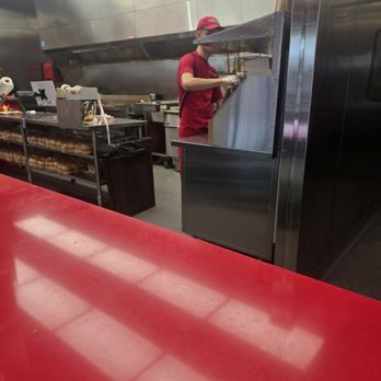 Five Guys - Dylan doing his job very diligently. - Burgers Near Me - Lakewood, Washington Five Guys - Dylan doing his job very diligently. - Burgers Near Me - Lakewood, Washington