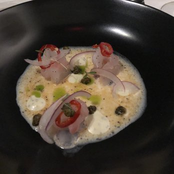 Atlas Bistro - NZ Hiramasa Kingfish Crudo - Fresno Peppers, Crispy Caper, Garlic Poppy Seed Emulsion, Chive Oil, Buttermilk Broth, Cilantro - New American Near Me - Scottsdale, Arizona