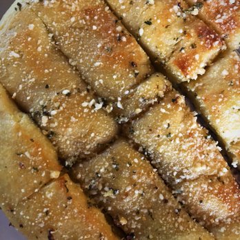Benito's Pizza - Breadsticks - don't forget the garlic cream cheese for dipping! - Pizza Near Me - Novi, Michigan Benito's Pizza - Breadsticks - don't forget the garlic cream cheese for dipping! - Pizza Near Me - Novi, Michigan