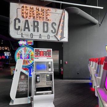 Lucky Strike Somerville - a slot machine in a casino - Bowling Near Me - Somerville, Massachusetts