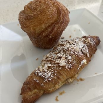 Creme De La Crumb - Almond croissant and cruffin - Coffee & Tea Near Me - Edmond, Oklahoma Creme De La Crumb - Almond croissant and cruffin - Coffee & Tea Near Me - Edmond, Oklahoma