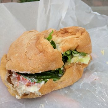 Serrano B-B-Q - ows a closeup of a sandwich - Barbeque Near Me - Montreal, Quebec Serrano B-B-Q - ows a closeup of a sandwich - Barbeque Near Me - Montreal, Quebec