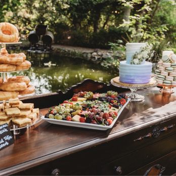 Flour Child Baking Company - a display of doughnuts - Caterers Near Me