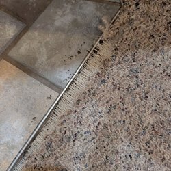 Surf Or Sound Realty - Carpet in dining area.