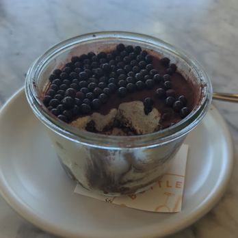 North Italia - Tiramisu in a little glass bowl with crunchy chocolate spheres on top - Italian Near Me - Phoenix, Arizona