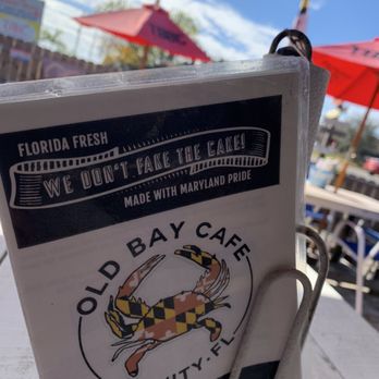 Old Bay Cafe - Picnic table area and menu - Seafood Near Me - New Port Richey, Florida Old Bay Cafe - Picnic table area and menu - Seafood Near Me - New Port Richey, Florida
