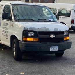 a white van parked in a parking lot