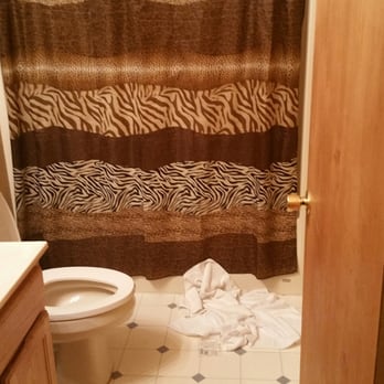 Cabins USA - Towels thrown on floor with empty tissue rolls - Vacation Rentals Near Me - Sevierville, Tennessee Cabins USA - Towels thrown on floor with empty tissue rolls - Vacation Rentals Near Me - Sevierville, Tennessee