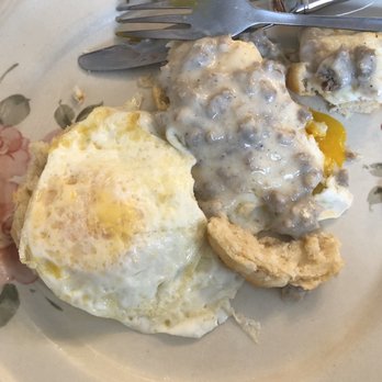 Eva's On Main - Half Order Biscuits and Sausage Gravy with eggs added. Yummy - Southern Near Me - Summerville, South Carolina