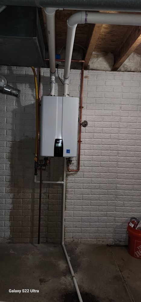 Slide of Woody's Water Heaters And Plumbing Services