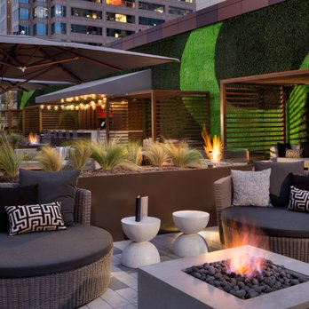 JW Marriott Austin - Outdoor seating, fire pits, new rooftop pool bar at Edge Pool Bar & Cabanas - Hotels Near Me - Austin, Texas