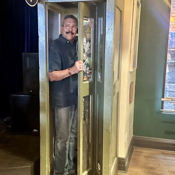 The Vic - Enjoying the old fashioned telephone booth - Bars Near Me - Salida, Colorado
