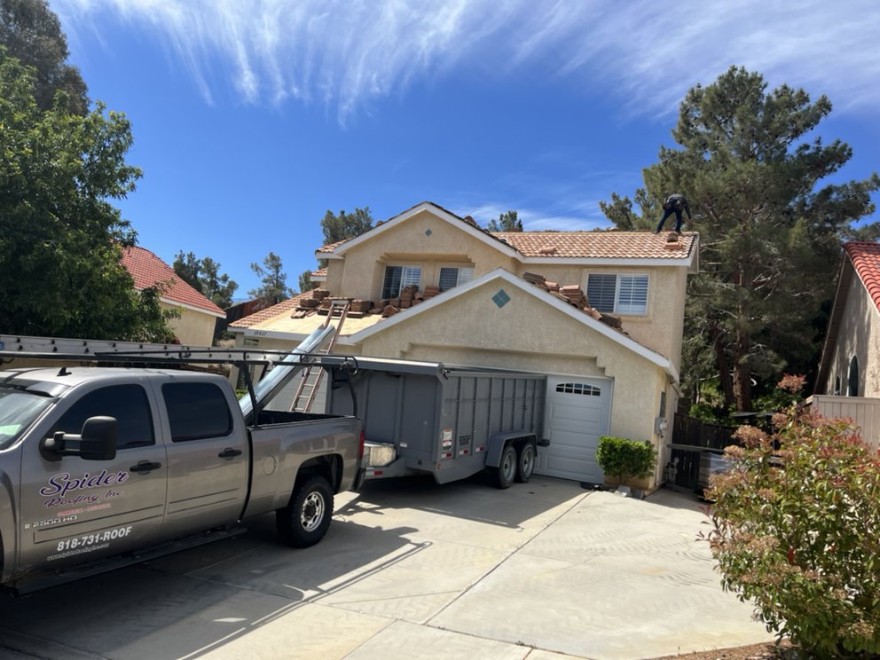 Slide of Spider Roofing