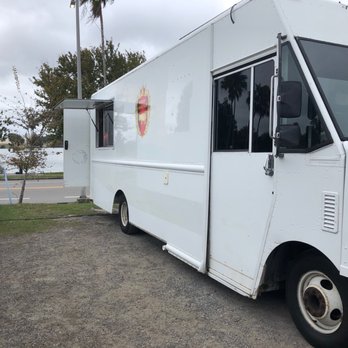 Smokin' Chanchos - white food truck - Food Trucks Near Me - Lakeland, Florida Smokin' Chanchos - white food truck - Food Trucks Near Me - Lakeland, Florida
