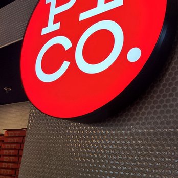 PI CO. - the pico logo on the wall - Pizza Near Me - Toronto, Ontario