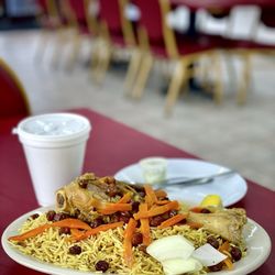 Afghan Village Restaurant & Afghan Halal Market - Qabuli Palau $14.06, Hot Afghan Tea $2.99 according to the receipt - not menu.
