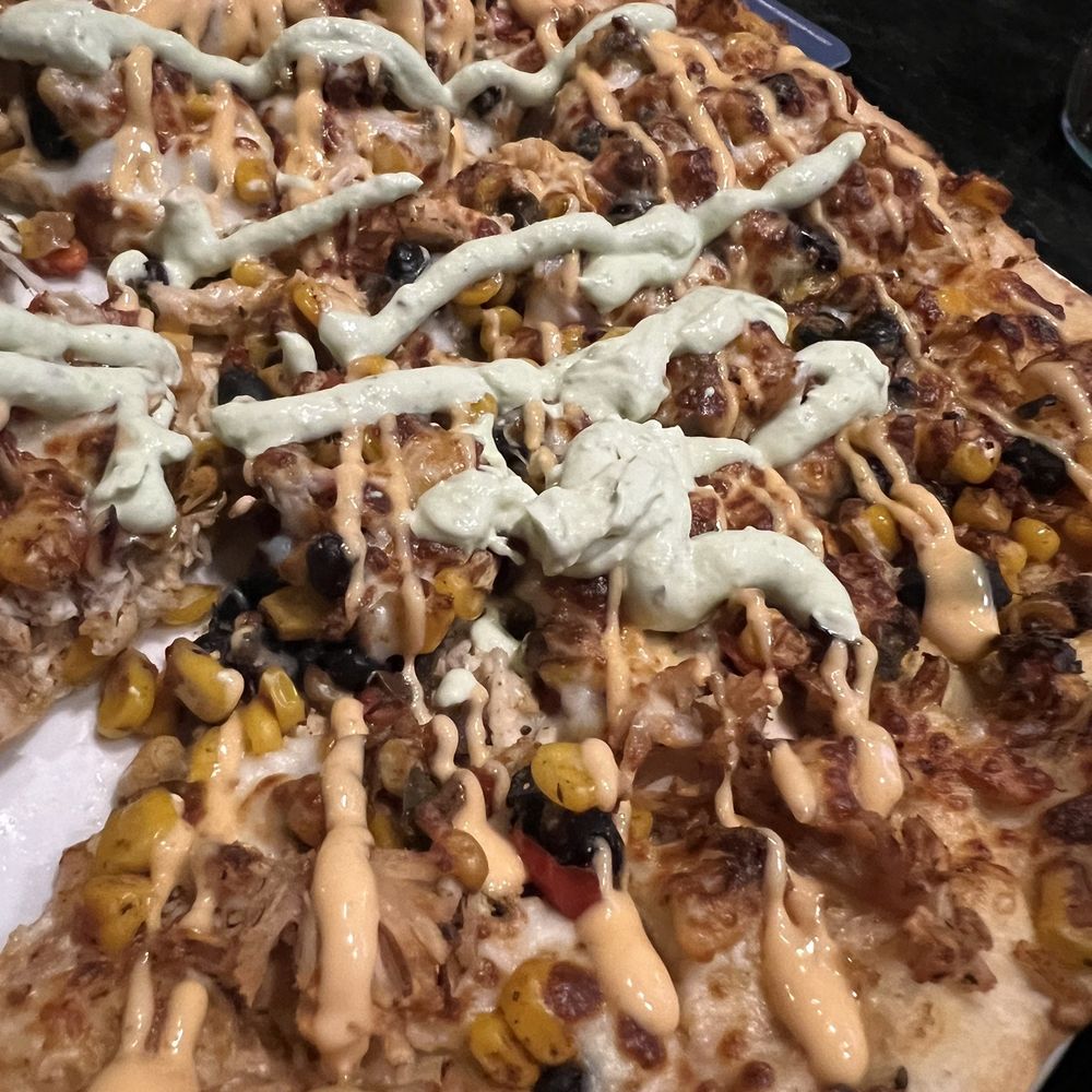 New England's Tap House Grille - Fiesta chicken flat bread pizza. Very good. - American Near Me - Hooksett, New Hampshire New England's Tap House Grille - Fiesta chicken flat bread pizza. Very good. - American Near Me - Hooksett, New Hampshire