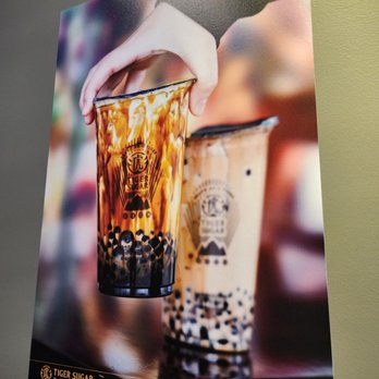 TIGER SUGAR - a hand holding a glass of bubble tea - Bubble Tea Near Me - Rockville, Maryland TIGER SUGAR - a hand holding a glass of bubble tea - Bubble Tea Near Me - Rockville, Maryland