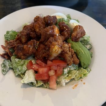 Single Fin Surf Grill - Cobb salad with sriracha fried chicken - Bars Near Me - San Diego, California Single Fin Surf Grill - Cobb salad with sriracha fried chicken - Bars Near Me - San Diego, California