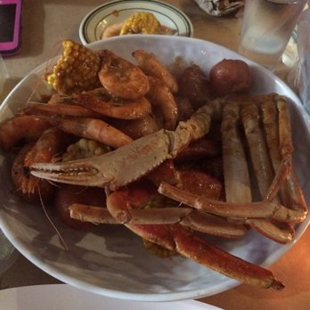 Claw Daddy's - Crab and shrimp old bay spicy seasoning with taters and corn! Two separate orders dumped in the plate - Cajun/Creole Near Me - New York, New York Claw Daddy's - Crab and shrimp old bay spicy seasoning with taters and corn! Two separate orders dumped in the plate - Cajun/Creole Near Me - New York, New York