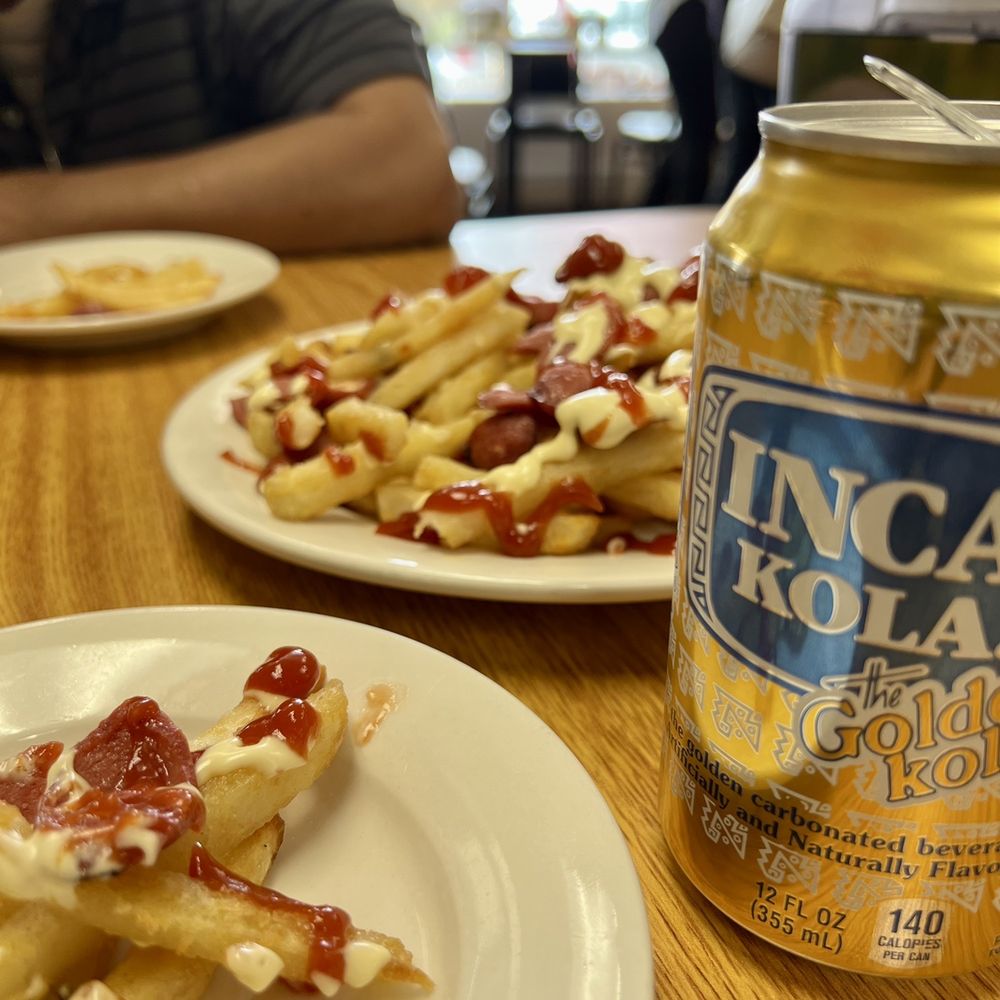 somos peru - a plate of french fries and a can of inca cola - International Grocery Near Me - West Haven, Connecticut somos peru - a plate of french fries and a can of inca cola - International Grocery Near Me - West Haven, Connecticut