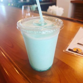 Coyote Moon Vineyards - a drink in a plastic cup with a straw - Wineries Near Me - Clayton, New York Coyote Moon Vineyards - a drink in a plastic cup with a straw - Wineries Near Me - Clayton, New York